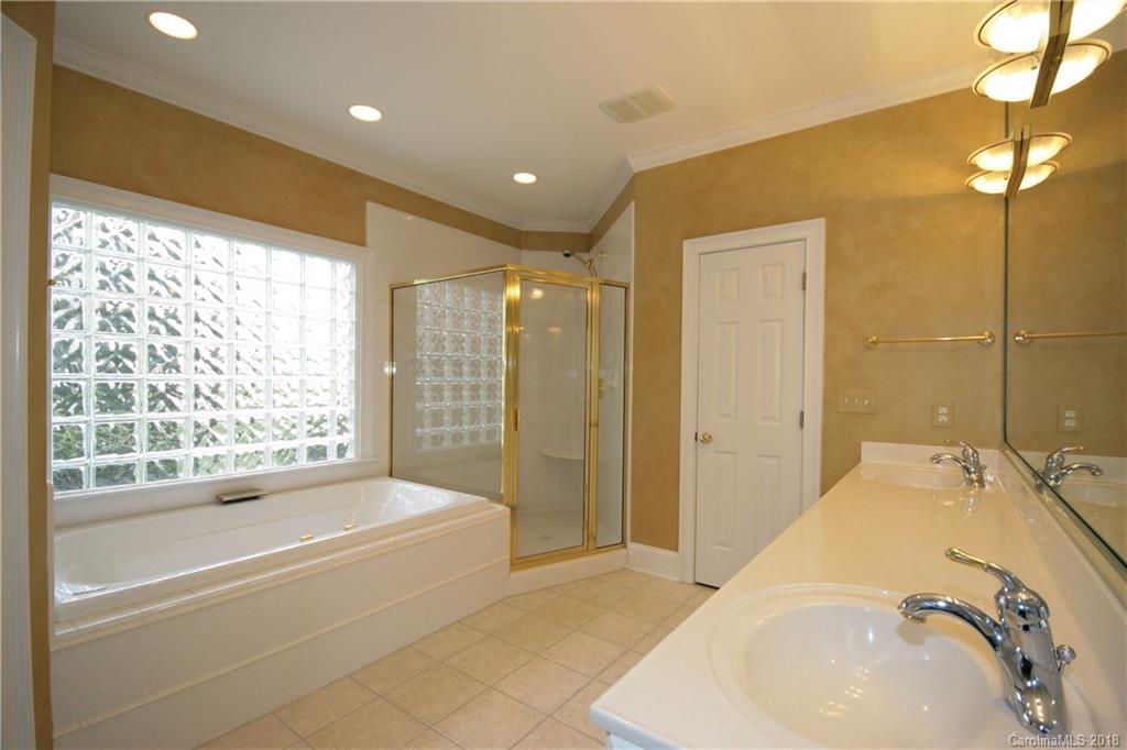 18628 Square Sail Road Cornelius, NC 28031 - Photo 12 of 19 a spacious bathroom with sink shower and bathtub