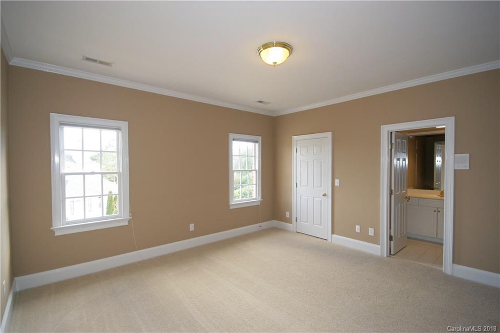 18628 Square Sail Road Cornelius, NC 28031 - Photo 14 of 19 an empty room with windows and closet