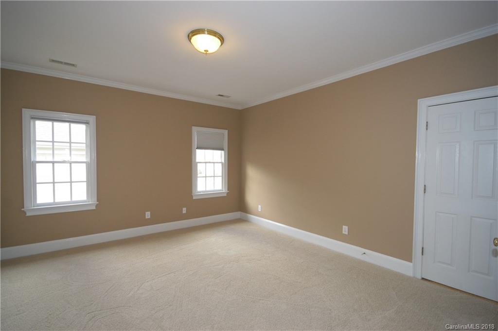 18628 Square Sail Road Cornelius, NC 28031 - Photo 15 of 19 an empty room with windows