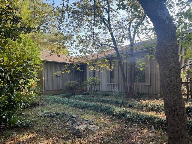 9945 Tracy Road Atoka, TN 38004 - Photo 1 of 19 a view of a house with large trees and a tree