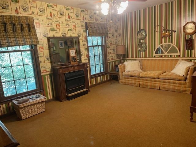 9945 Tracy Road Atoka, TN 38004 - Photo 4 of 19 a living room with furniture a flat screen tv and a fireplace