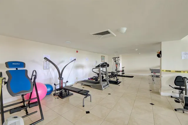 a view of a room with gym equipment