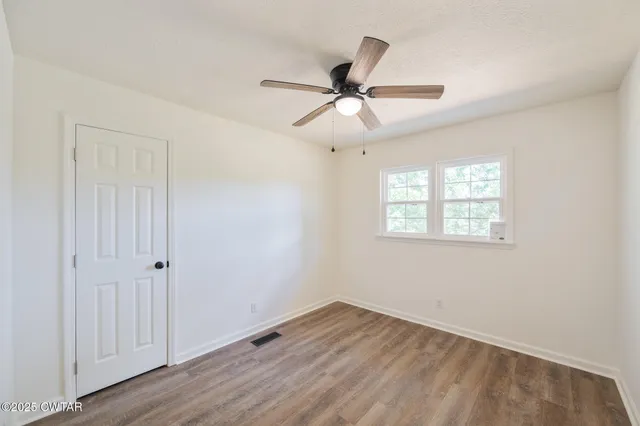 a room with a sink and a window
