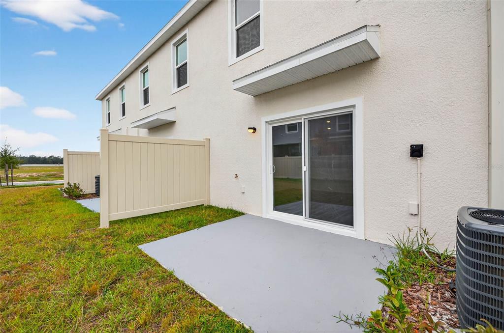 31264 Paper Birch Street Wesley Chapel, FL 33545 - Photo 14 of 32 a front view of a house with a yard