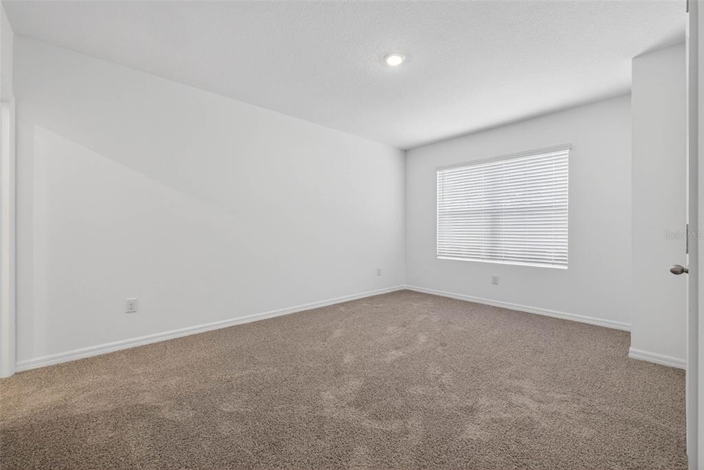 31264 Paper Birch Street Wesley Chapel, FL 33545 - Photo 16 of 32 an empty room with a window