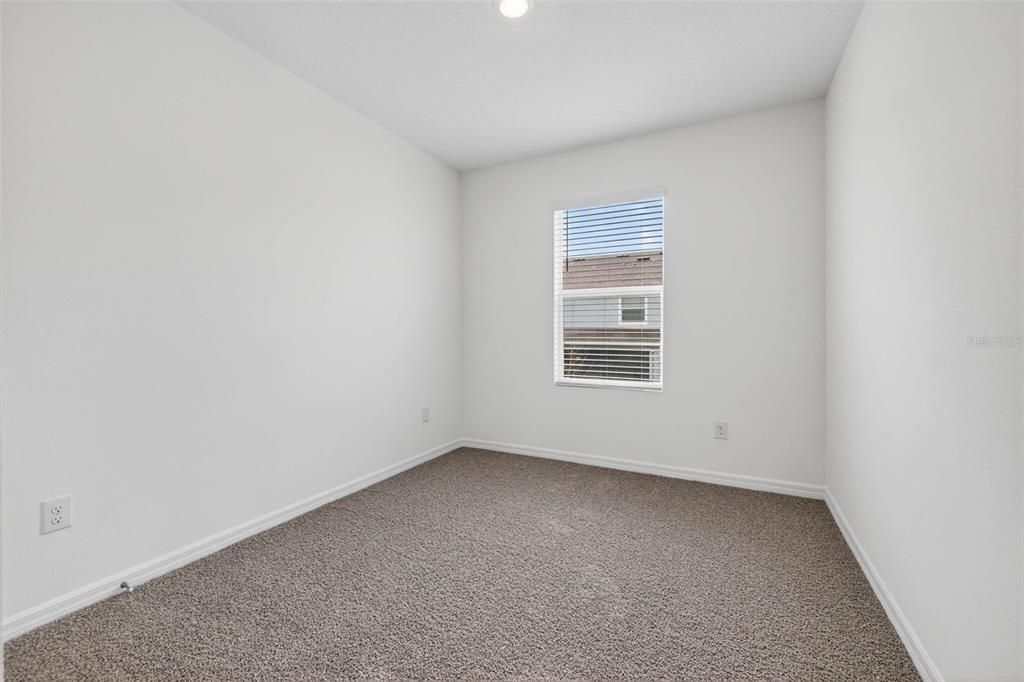 31264 Paper Birch Street Wesley Chapel, FL 33545 - Photo 21 of 32 an empty room with a window