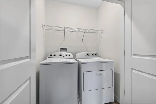 a utility room with dryer and washer
