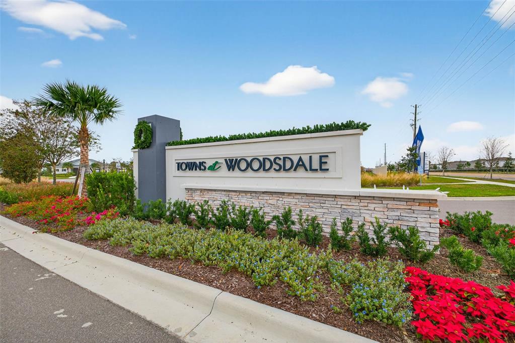 31264 Paper Birch Street Wesley Chapel, FL 33545 - Photo 25 of 32 a sign on the side of a building