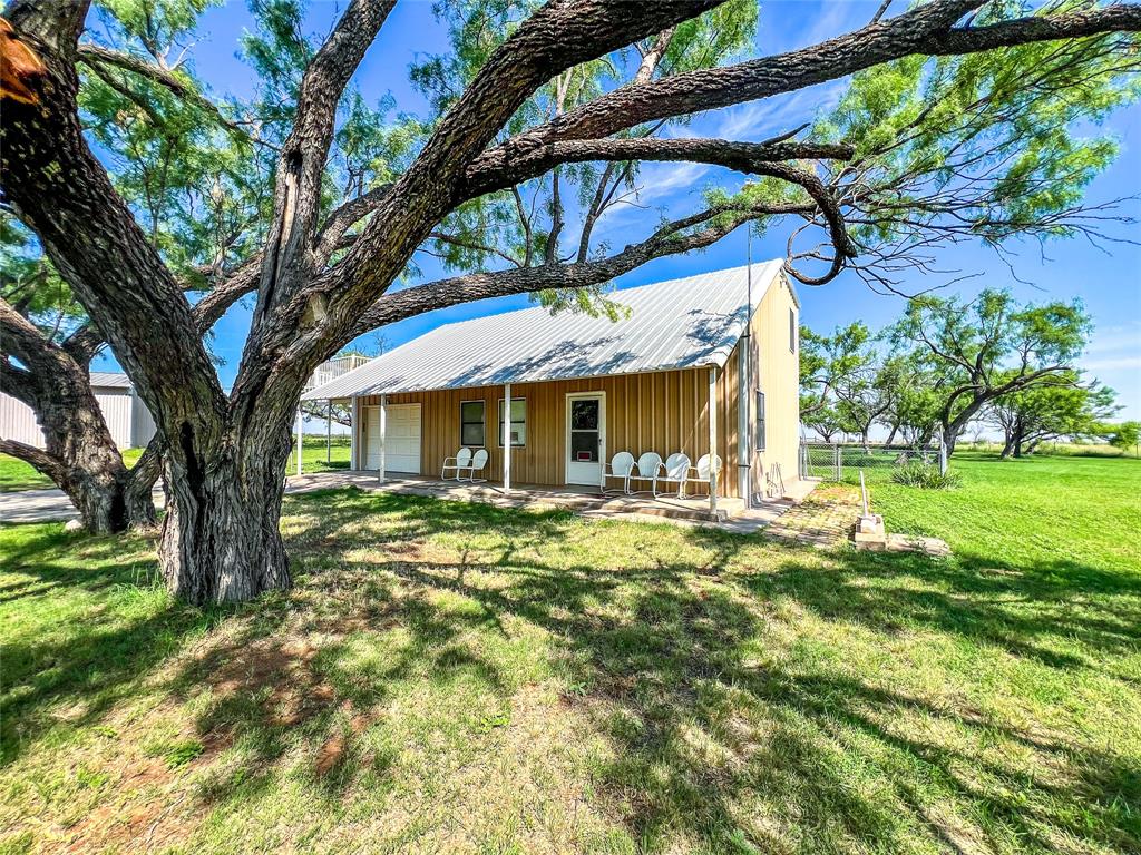 5260 County Road 268 Anson, TX 79501 - Photo 1 of 1 a view of a house with a yard