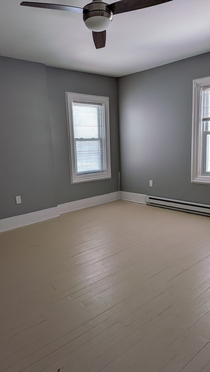 6 Brandon Road, Unit 2 Dudley, MA 01571 - Photo 9 of 9 an empty room with a window