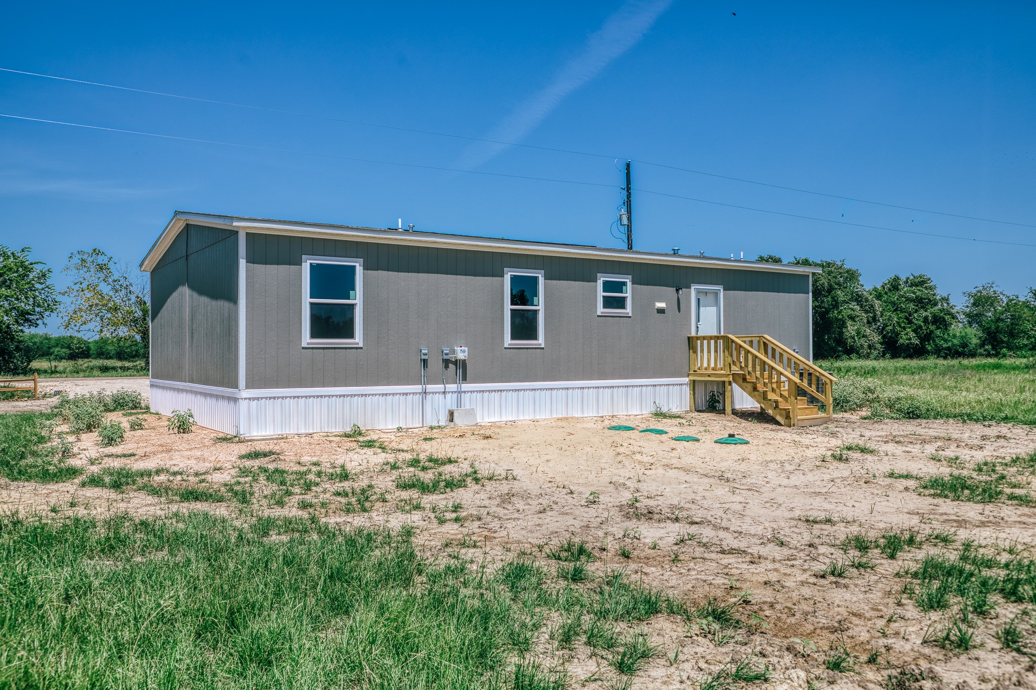 11146 Schmidt Road Waller, TX 77484 - Photo 23 of 37 Back of house with FHA steps
