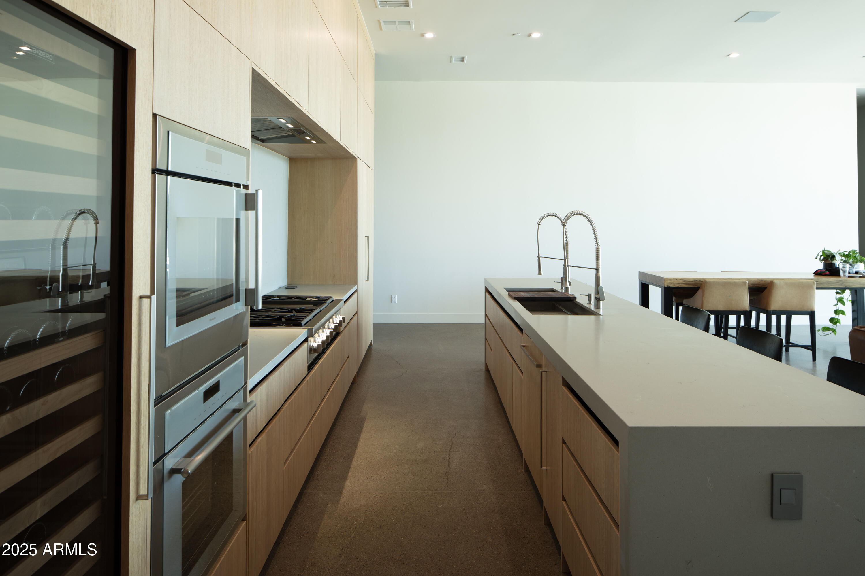 10310 North 37th Street Phoenix, AZ 85028 - Photo 15 of 51 a kitchen with a sink and refrigerator