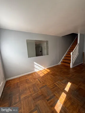 a view of a big room with wooden floor