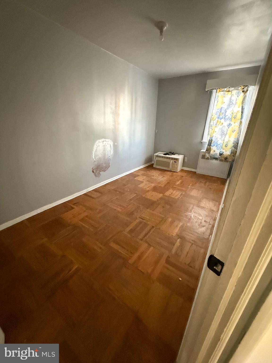 557 Wiltshire Road Upper Darby, PA 19082 - Photo 10 of 27 a view of empty room with window
