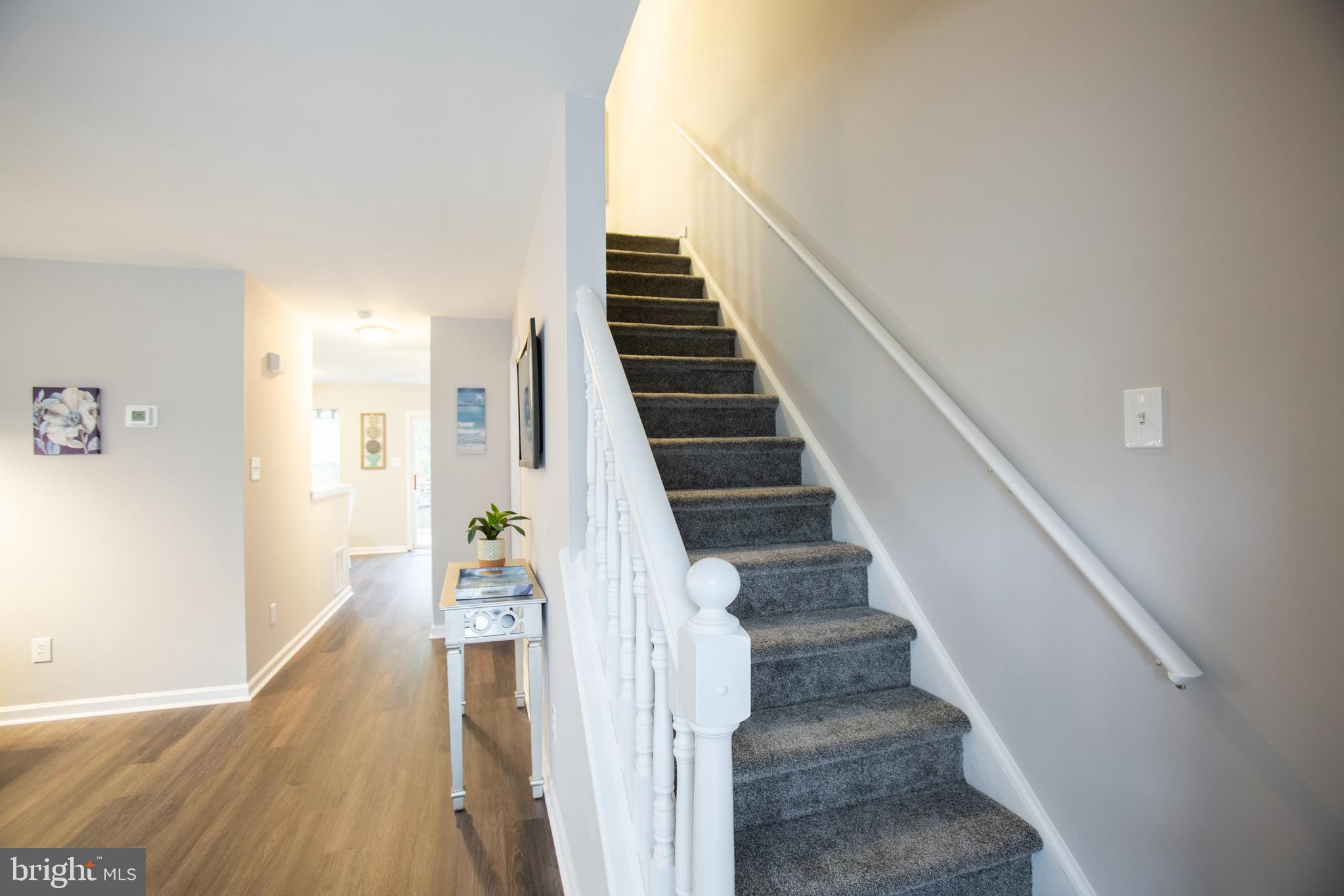 25 Millstream Road Laurel Springs, NJ 08021 - Photo 20 of 31 a view of entryway and hall with wooden floor