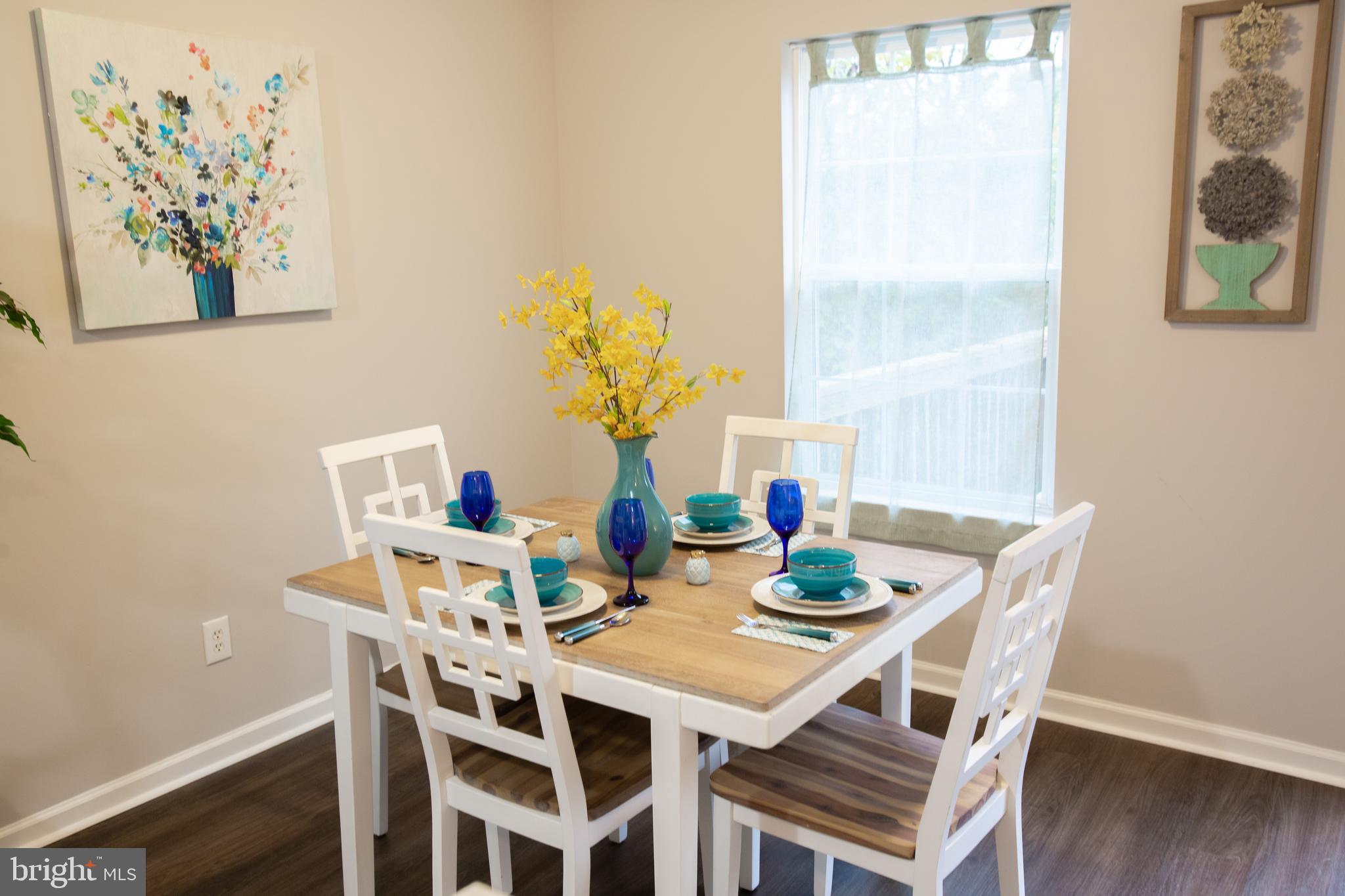 25 Millstream Road Laurel Springs, NJ 08021 - Photo 9 of 31 a view of a dining room with furniture and wooden floor