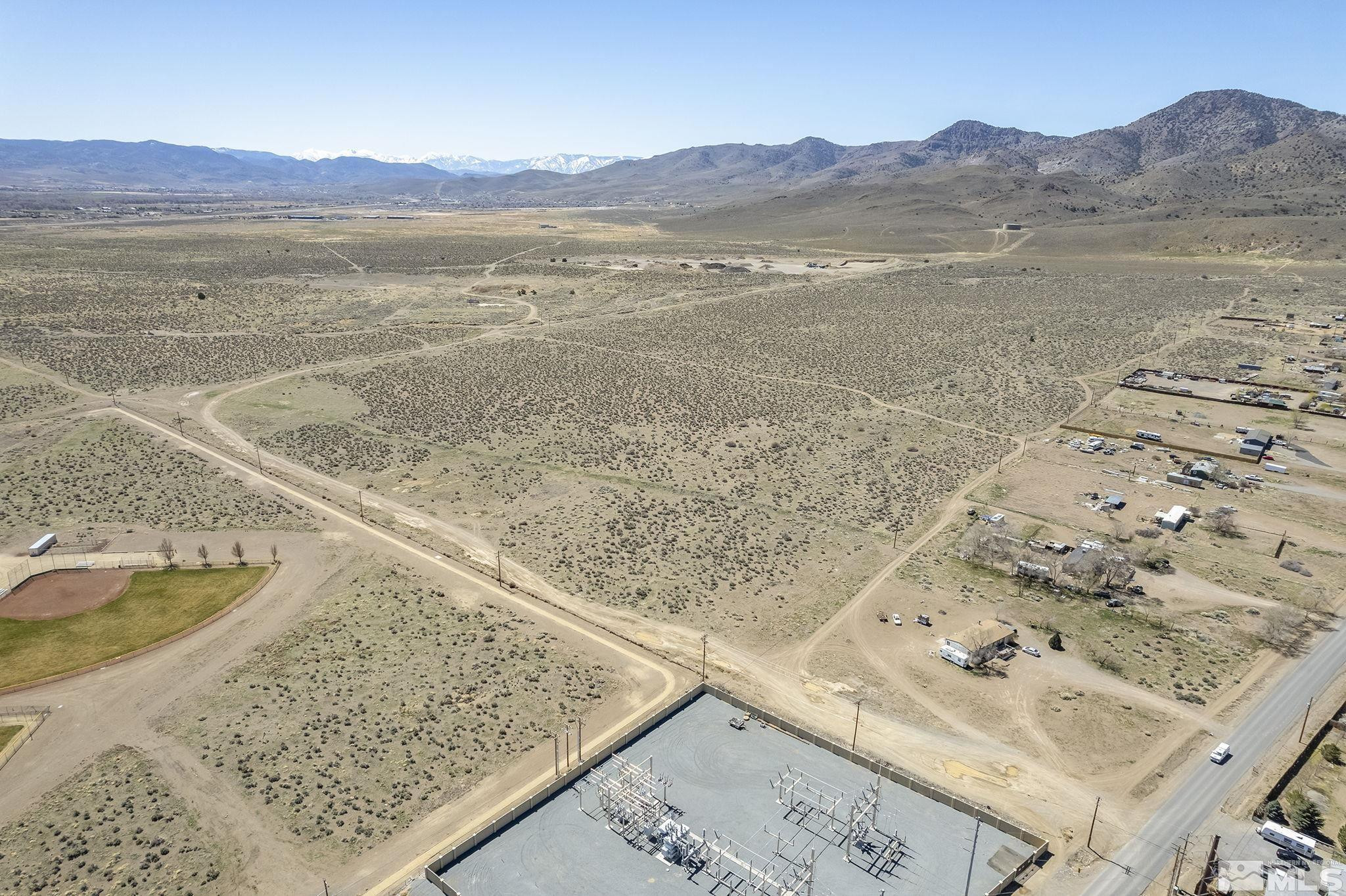 1640104 Parcel Lyon County Dayton, NV 89403 - Photo 5 of 14 a view of a mountain from a lake