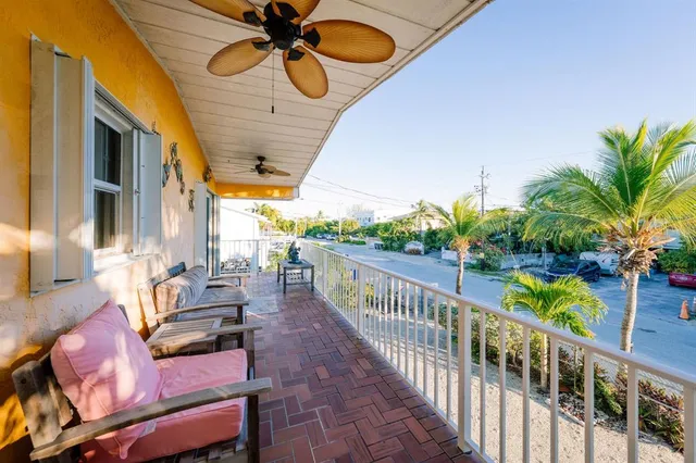 a view of a porch with furniture