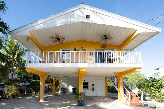 a view of a street with stores