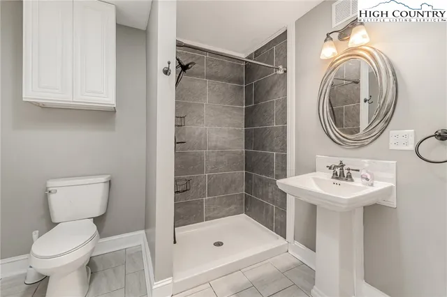 a view of balcony with wooden floor
