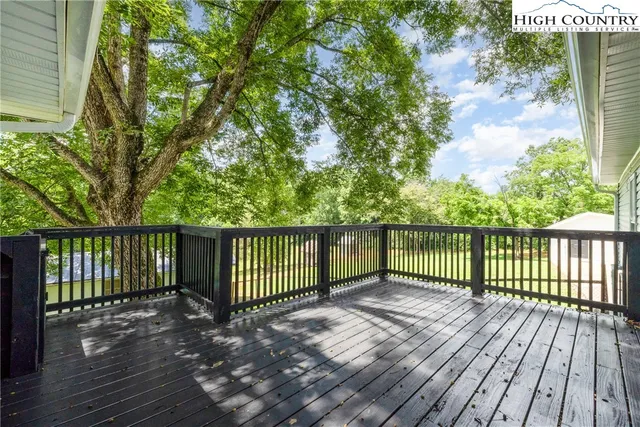 a view of a street view from a balcony