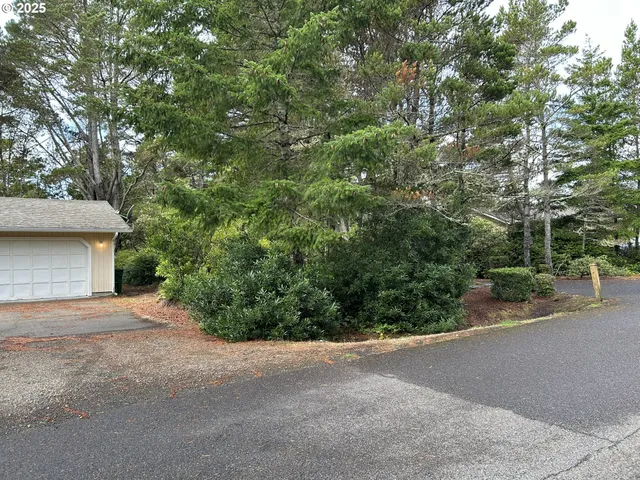 a view of a house with a street