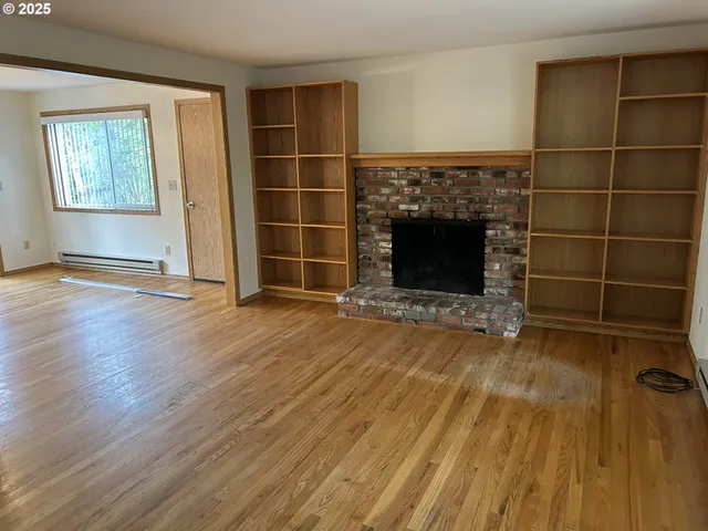 a living room with a fireplace