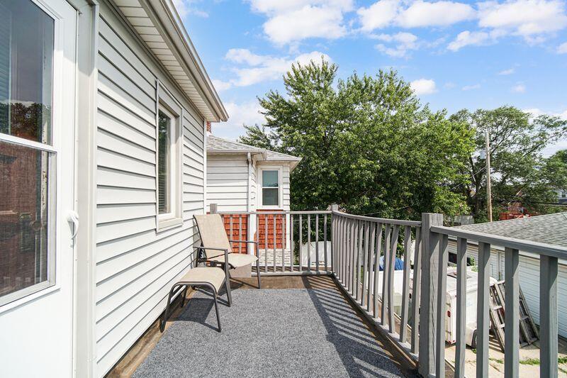 1012 177th Place Hammond, IN 46324 - Photo 16 of 26 a view of a balcony with chairs