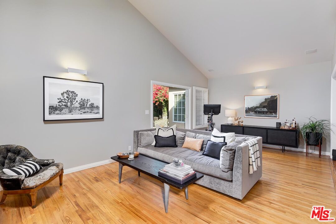 10629 Rountree Road Los Angeles, CA 90064 - Photo 20 of 37 a living room with furniture and wooden floor