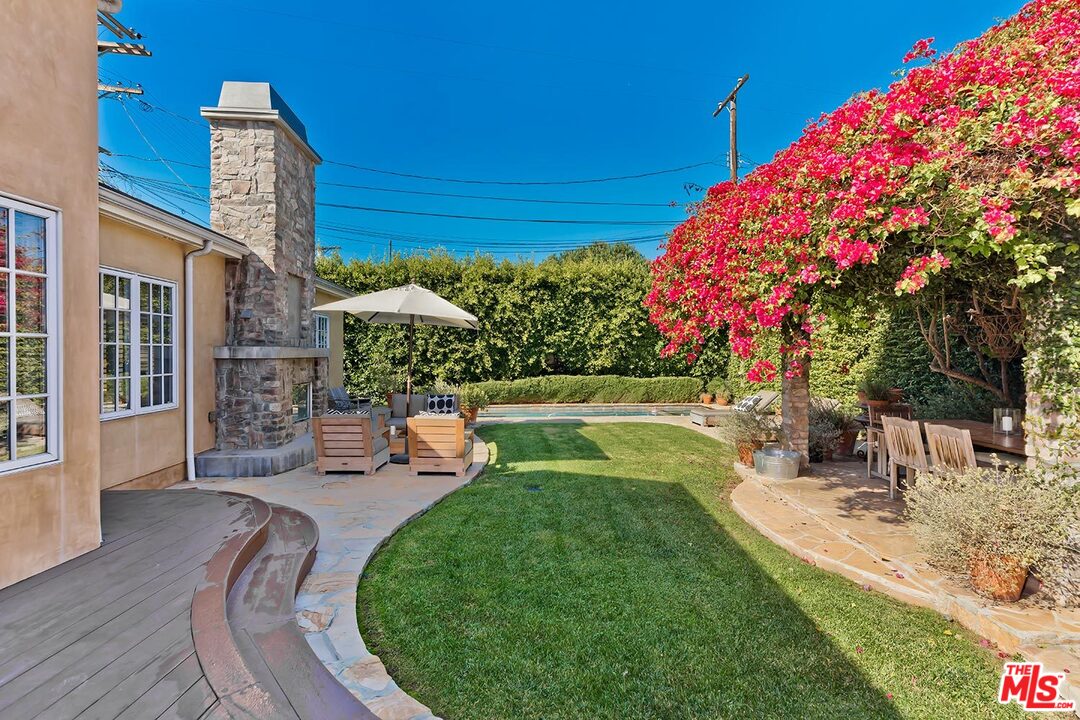 10629 Rountree Road Los Angeles, CA 90064 - Photo 31 of 37 a front view of a house with garden