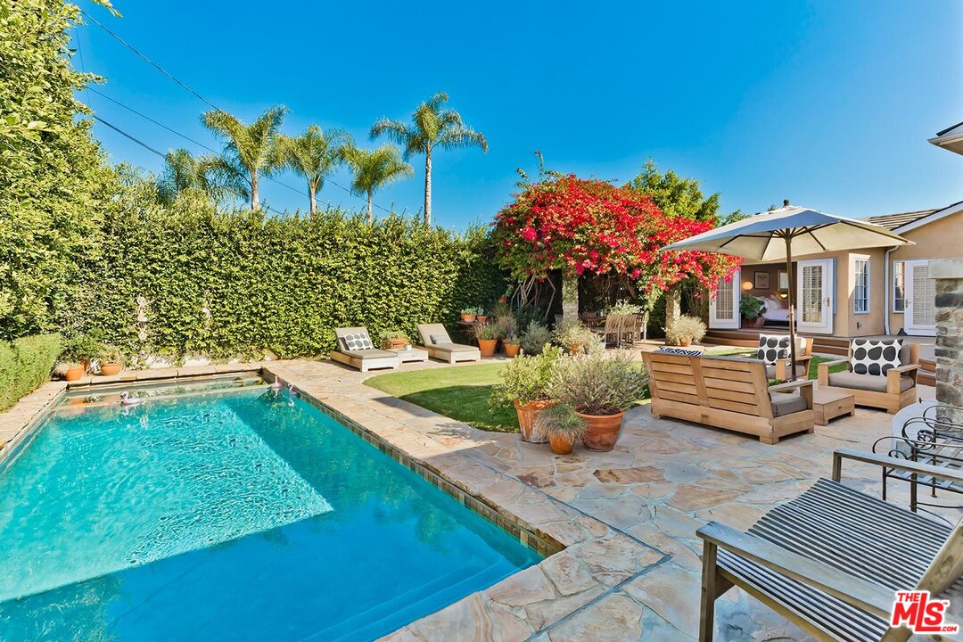 10629 Rountree Road Los Angeles, CA 90064 - Photo 36 of 37 a view of a swimming pool with lounge chair