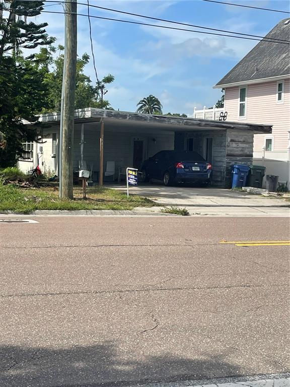 2445 Webber Street Sarasota, FL 34239 - Photo 2 of 16 a view of a house and a yard