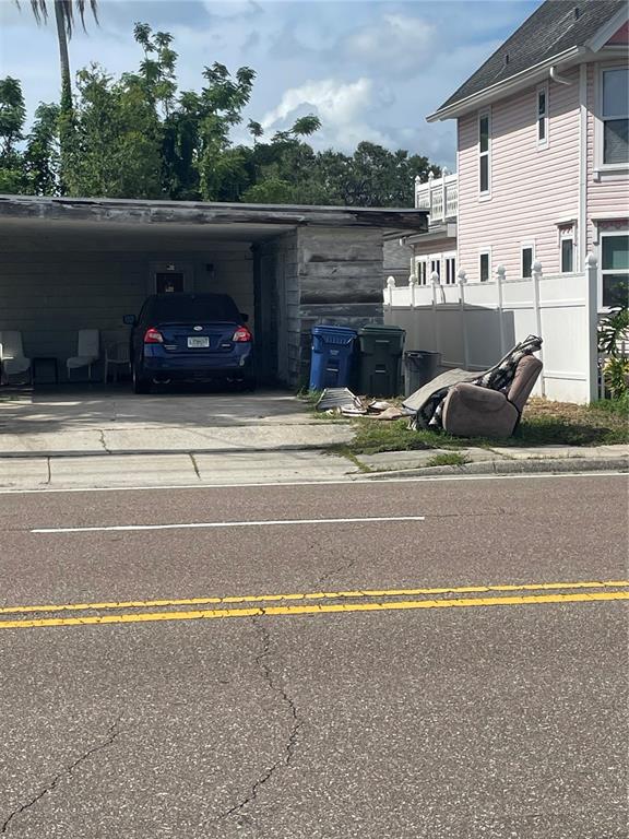 2445 Webber Street Sarasota, FL 34239 - Photo 5 of 16 a view of car parked in front of a building
