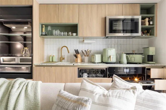 a bathroom with a toilet and a mirror