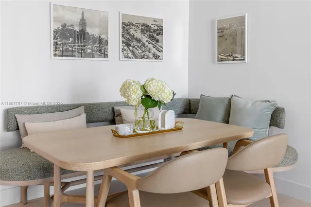 a bedroom with a bed and a night stand