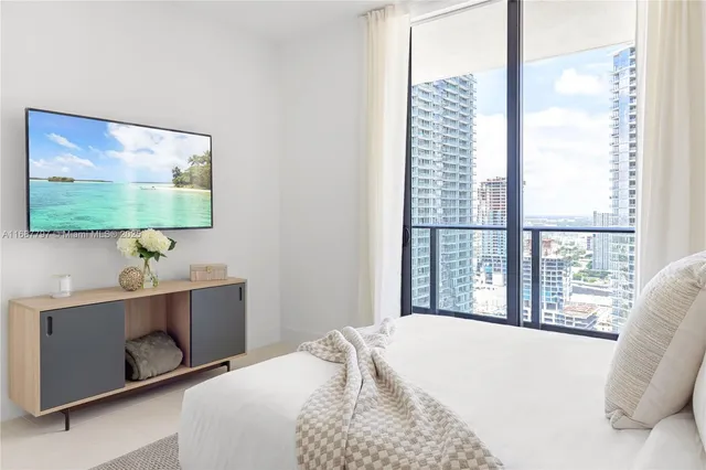 a bathroom with a shower and toilet