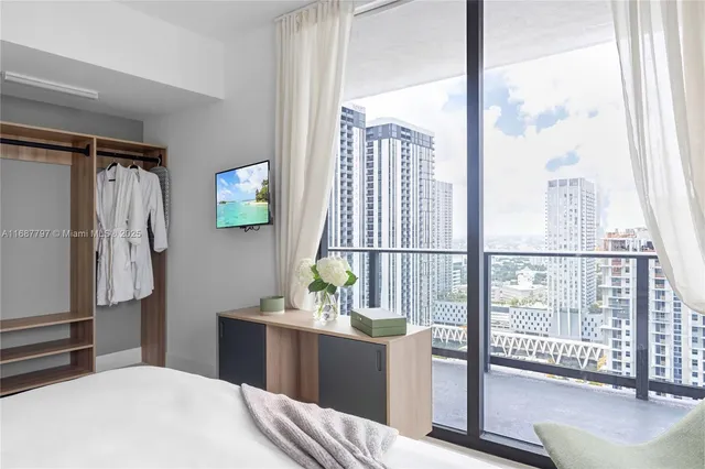 a view of a city with tall buildings