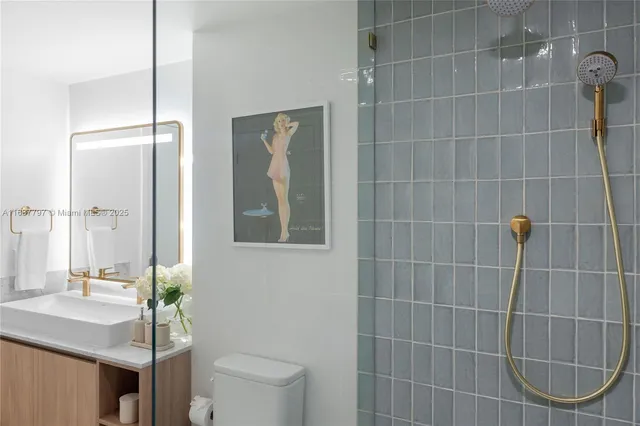 a view of a workspace with furniture and a gate