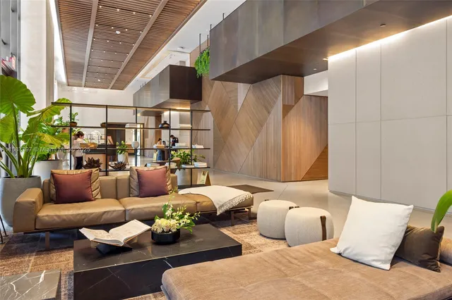 a bedroom with a bed and a chair