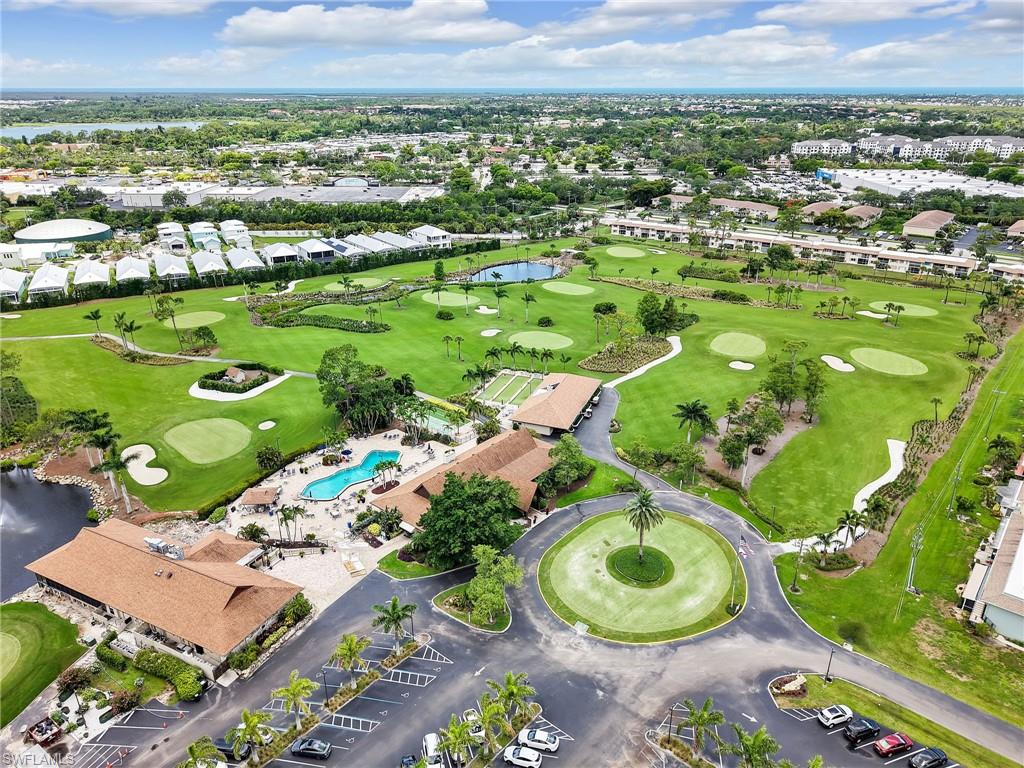 119 Harrison Road, Unit 16 Naples, FL 34112 - Photo 20 of 26 View of property location with a large body of water and a local golf course