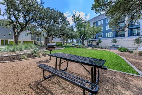 a view of a bench in a patio