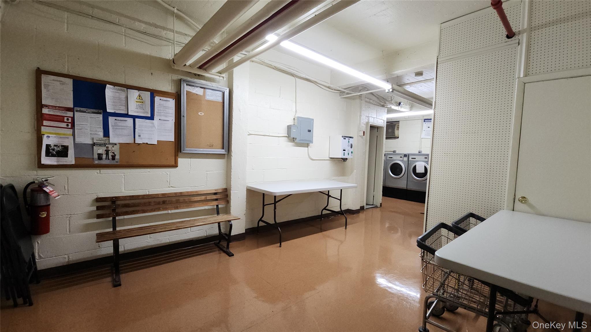 99-10 60th Avenue, Unit 3H Queens, NY 11368 - Photo 21 of 25 a bedroom with furniture and a window