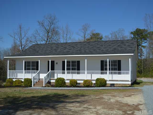 5660 Zacks Mill Road Angier, NC 27501 - Photo 1 of 24 Newly updated spacious ranch home on 1.25 acre lot. Notice the new landscaping, new stone drive and sidewalk, also the full length covered front porch where you will enjoy beautiful sunshine days and with a great pond view!