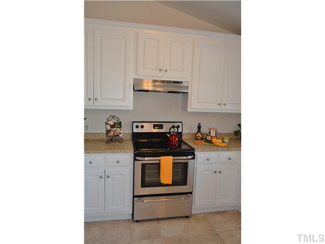 5660 Zacks Mill Road Angier, NC 27501 - Photo 11 of 24 A closer view of the brand new stainless appliances, this is a smooth top self cleaning stove.