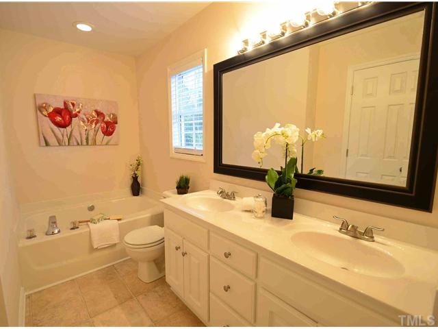 5660 Zacks Mill Road Angier, NC 27501 - Photo 14 of 24 View of the luxurious new master bathroom with double vanities, new mirror, large soaking tub and separate shower! Also new flooring and new paint.