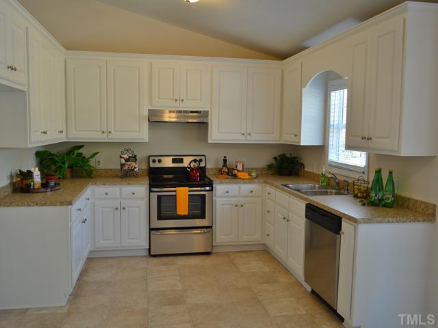 5660 Zacks Mill Road Angier, NC 27501 - Photo 7 of 24 This is a cook's kitchen with new stainless appliances, new counter tops, new flooring, new paint, new lighting! Lots of beautiful cabinets too.