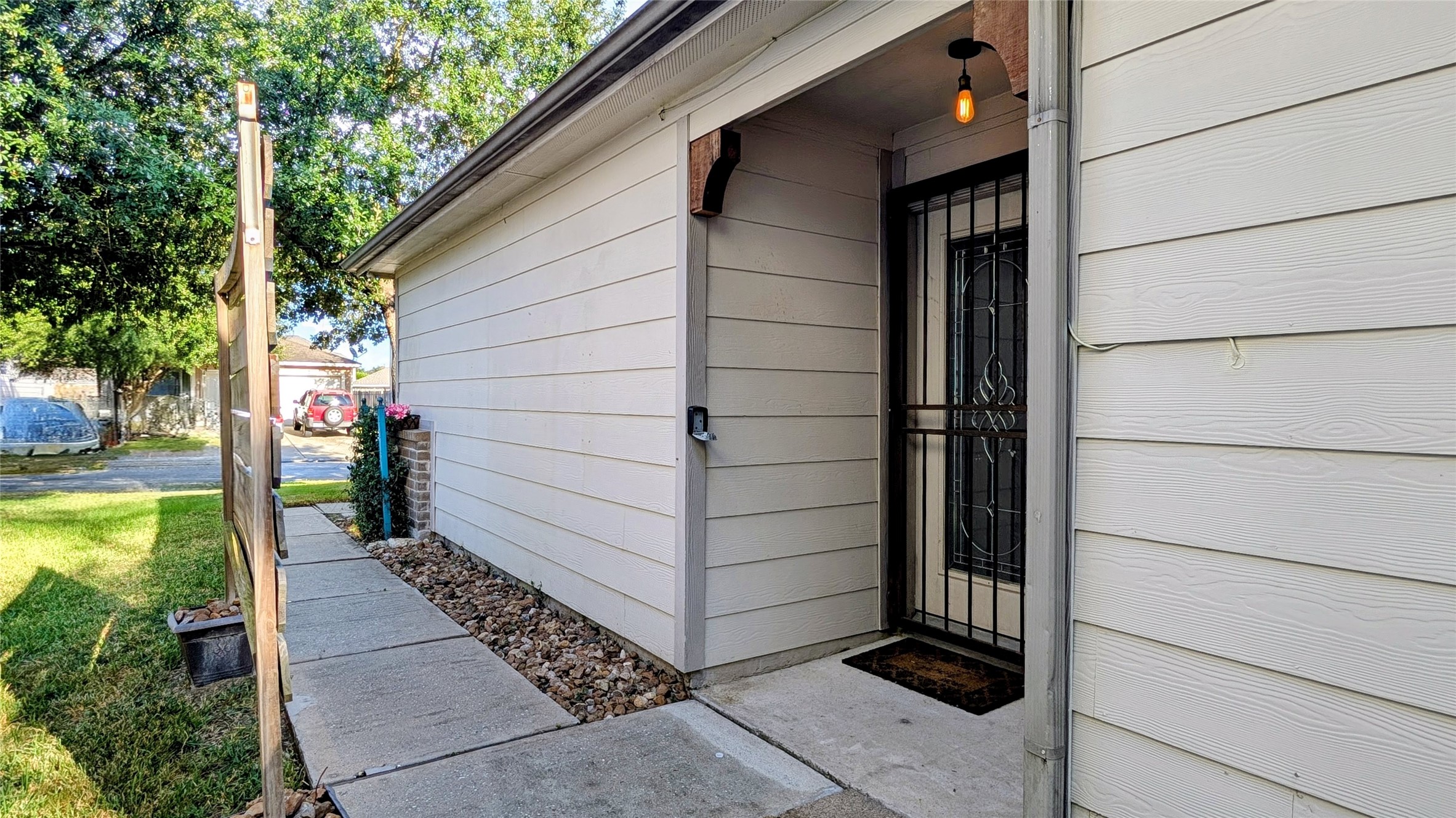 1918 Adobe Stone Drive Humble, TX 77396 - Photo 4 of 16 a view of a pathway of a house with a yard