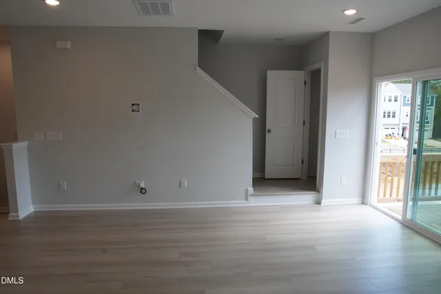 a bathroom with a mirror and a sink