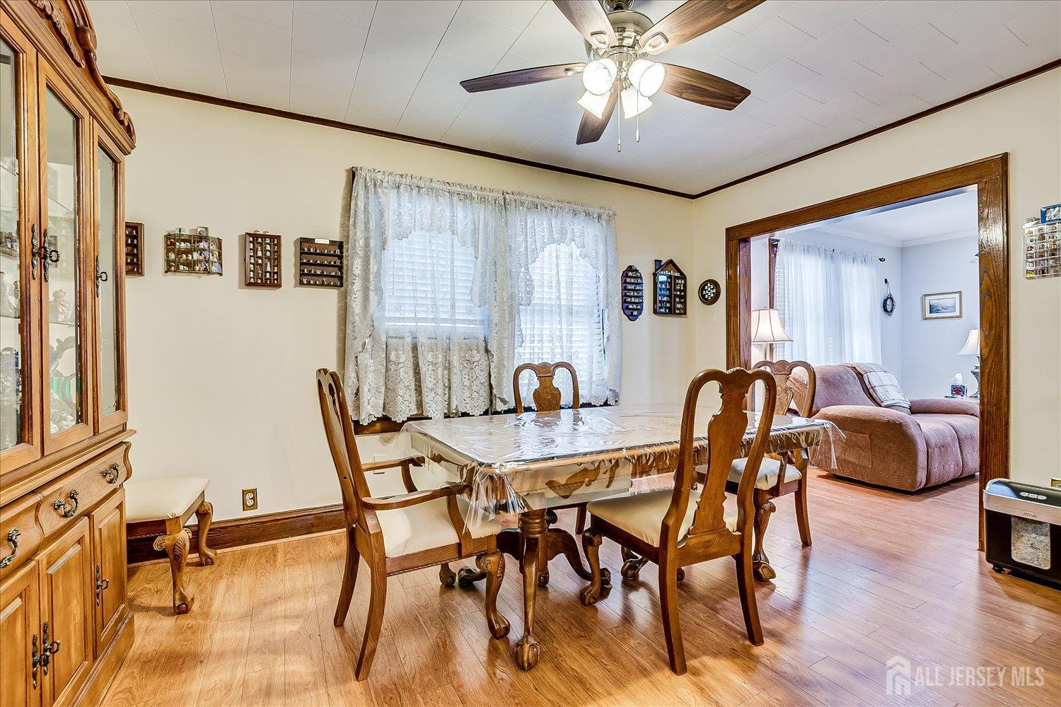 7 Clum Avenue Fords, NJ 08863 - Photo 13 of 43 a view of a dining room with furniture and chandelier