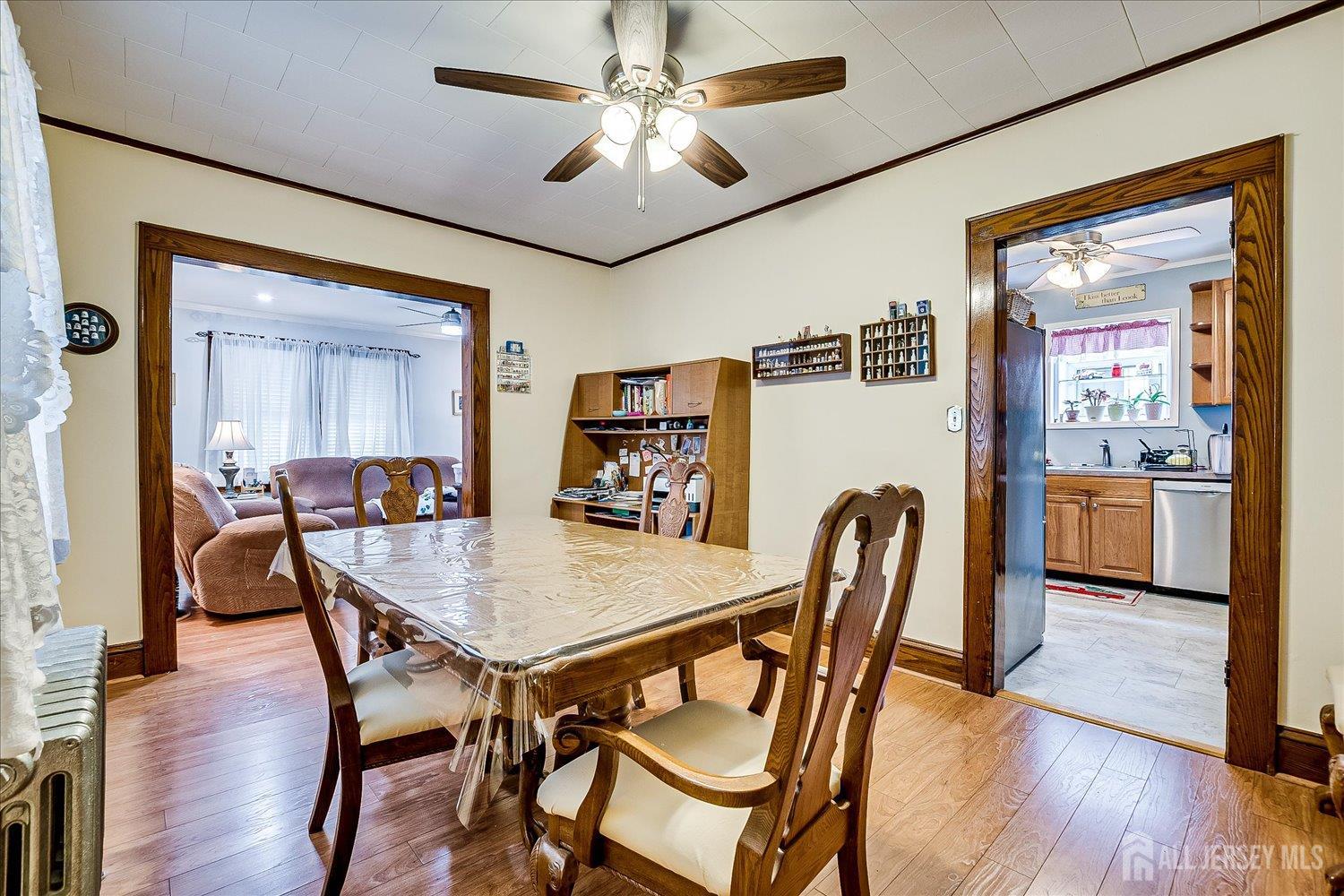 7 Clum Avenue Fords, NJ 08863 - Photo 14 of 43 a view of a dining room with furniture and wooden floor